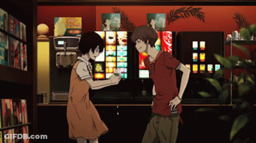 A Man And A Woman Are Standing In Front Of A Vending Machine That Has A Coca Cola Sign On It GIF