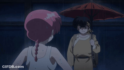 Man And Woman Standing In Rain With Umbrella GIF