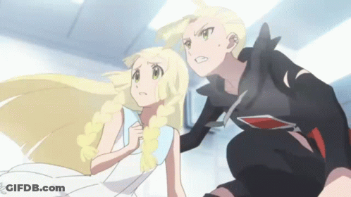 A Man And A Woman Are Standing Next To Each Other . GIF
