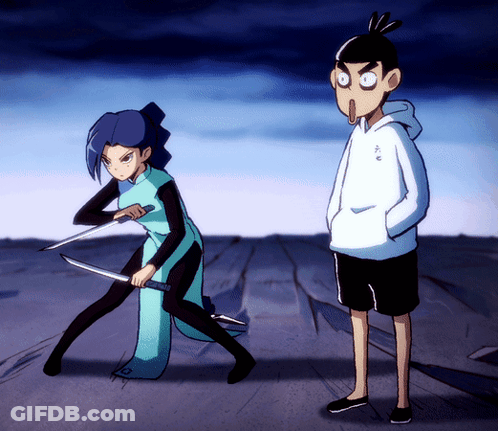 A Man And A Woman Are Standing Next To Each Other GIF