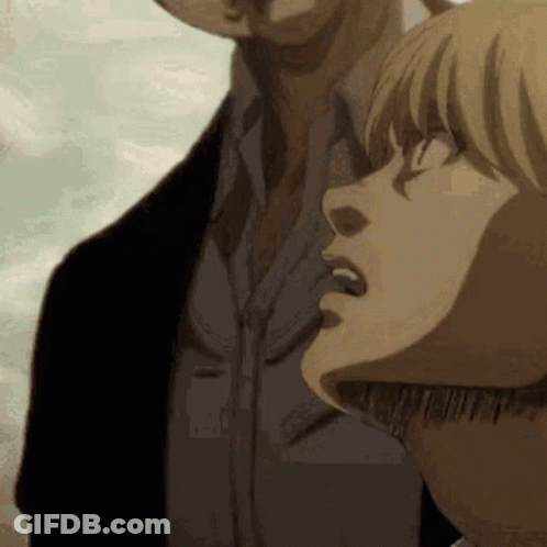A Man And A Woman Are Standing Next To Each Other And Looking At The Sky . GIF