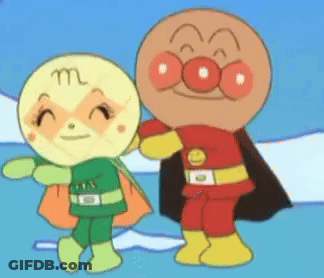 A Man And A Woman Are Standing Next To Each Other And One Has The Letter M On Her Face GIF