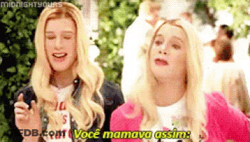 A Man And A Woman Are Standing Next To Each Other And One Of Them Is Talking In A Language Other Than English . GIF