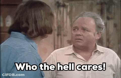 Man And Woman Talking, Man Says Who The Hell Cares GIF