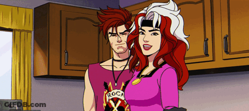 A Man And A Woman Are Standing Next To Each Other And The Man Has A Shirt That Says Roca On It GIF