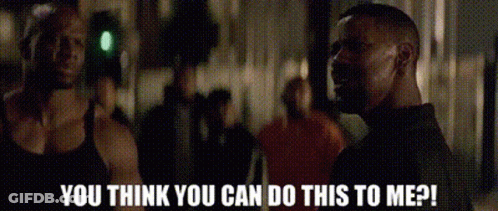 A Man And A Woman Are Standing Next To Each Other And The Man Is Asking The Woman If She Can Do Something To Him . GIF