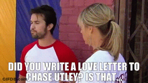 A Man And A Woman Are Standing Next To Each Other And The Man Is Asking The Woman If She Wrote A Love Letter GIF