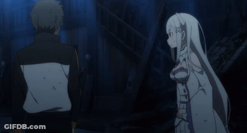 A Man And A Woman Are Standing Next To Each Other And The Man Is Holding The Woman 'S Hand GIF