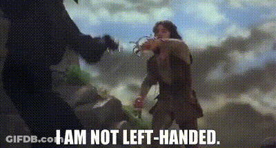 A Man And A Woman Are Standing Next To Each Other And The Man Is Saying `` I Am Not Left-Handed '' . GIF