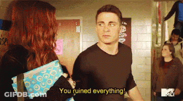 A Man And A Woman Are Standing Next To Each Other And The Man Is Saying You Ruined Everything GIF
