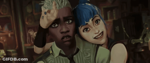 A Man And A Woman Are Standing Next To Each Other And The Man Is Wearing A Green Shirt With The Number 12 On The Front GIF