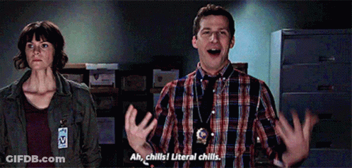A Man And A Woman Are Standing Next To Each Other And The Man Says Ah Chills ! Literal Chills GIF