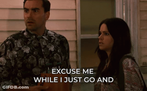 A Man And A Woman Are Standing Next To Each Other And The Man Says Excuse Me While I Just Go And GIF