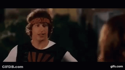 A Man And A Woman Are Standing Next To Each Other And The Man Says `` I Said You Look Shitty '' GIF