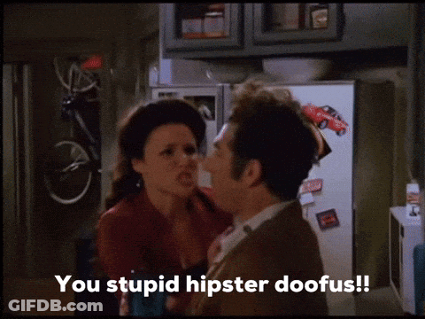 A Man And A Woman Are Standing Next To Each Other And The Man Says You Stupid Hipster Doofus ! GIF
