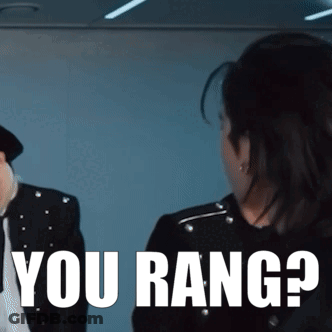A Man And A Woman Are Standing Next To Each Other And The Woman Is Asking The Man " You Rang ? " GIF