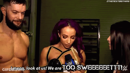 A Man And A Woman Are Standing Next To Each Other And The Woman Is Saying I Mean Look At Us We Are Too Sweet ! GIF