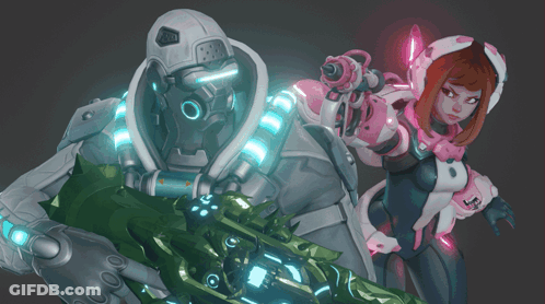A Man And A Woman Are Standing Next To Each Other And The Woman Is Wearing A Pink And White Outfit With The Letter L On GIF