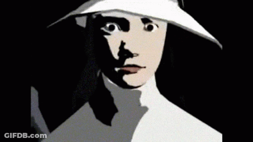 A Man And A Woman Are Standing Next To Each Other And The Woman Is Wearing A White Hat GIF