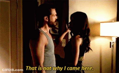 A Man And A Woman Are Standing Next To Each Other And The Woman Says That Is Not Why I Came Here GIF