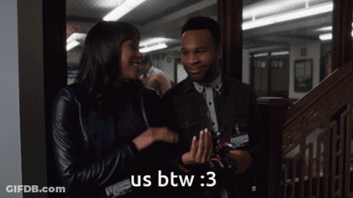 A Man And A Woman Are Standing Next To Each Other And The Woman Says Us Btw GIF
