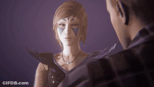 A Man And A Woman Are Standing Next To Each Other GIF