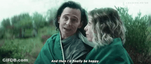 A Man And A Woman Are Standing Next To Each Other In A Field . GIF