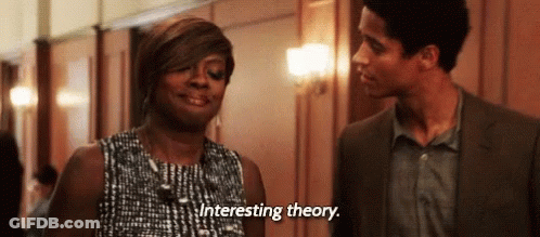 A Man And A Woman Are Standing Next To Each Other In A Hallway And The Woman Is Saying `` Interesting Theory . '' GIF