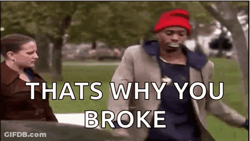 A Man And A Woman Are Standing Next To Each Other In A Park . The Man Is Wearing A Red Hat . GIF