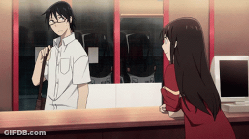 A Man And A Woman Are Standing Next To Each Other In Front Of A Window That Says ' Tokyo ' GIF