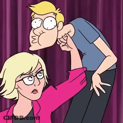 A Man And A Woman Are Standing Next To Each Other Making Funny Faces . GIF