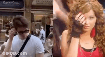 A Man And A Woman Are Standing Next To Each Other On A Sidewalk . GIF