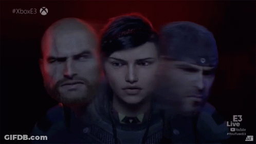 A Man And A Woman Are Standing Next To Each Other GIF
