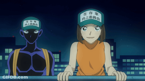 A Man And A Woman Are Standing Next To Each Other Wearing Hats With Chinese Characters On Them GIF