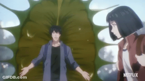 A Man And A Woman Are Standing Next To Each Other With A Netflix Logo On The Bottom GIF