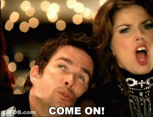 A Man And A Woman Are Standing Next To Each Other With The Words Come On Written On The Bottom GIF