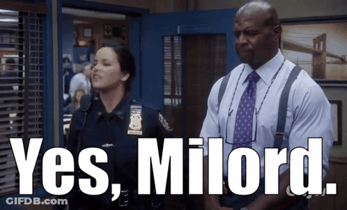 A Man And A Woman Are Standing Next To Each Other With The Words Yes Millord Written On The Bottom GIF