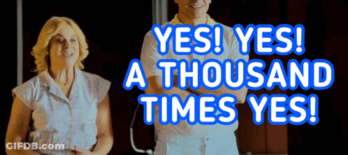 A Man And A Woman Are Standing Next To Each Other With The Words Yes Yes A Thousand Times Yes Behind Them GIF