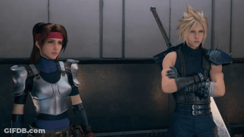 A Man And A Woman Are Standing Next To Each Other With Their Arms Crossed GIF