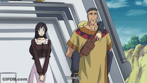 A Man And A Woman Are Standing Next To Each Other With Wendy Written On The Bottom GIF