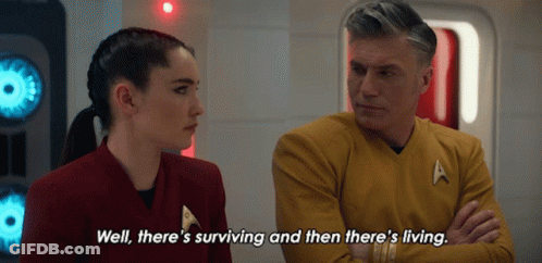 A Man And A Woman Are Talking And The Man Says Well There 'S Surviving And Then There 'S Living .. GIF