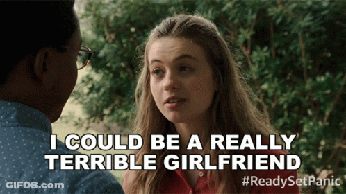 A Man And A Woman Are Talking And The Woman Says I Could Be A Really Terrible Girlfriend GIF