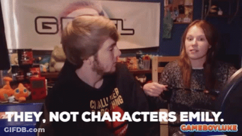 A Man And A Woman Are Talking In Front Of A Banner That Says " They Not Characters Emily " GIF