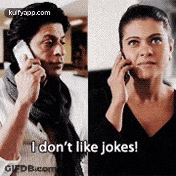 A Man And A Woman Are Talking On Cell Phones And The Man Is Saying `` I Don 'T Like Jokes ! '' GIF