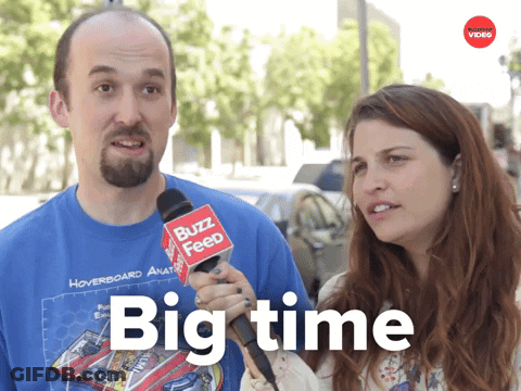 A Man And A Woman Are Talking To A Buzz Feed Reporter GIF