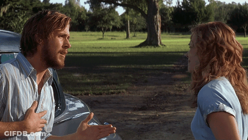 A Man And A Woman Are Talking To Each Other In A Field GIF