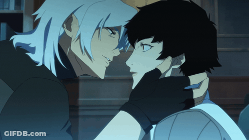 A Man And A Woman Are Touching Each Other 'S Faces GIF