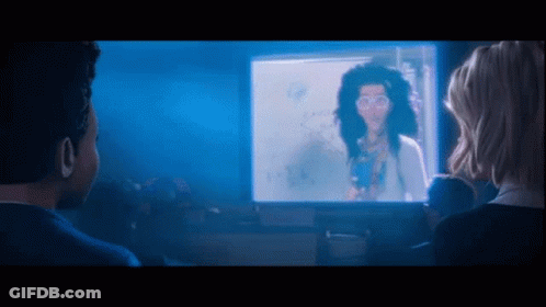 Man And Woman Watching Video On Computer GIF