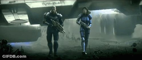 A Man And A Woman Holding Guns In Front Of A Ship That Says " M44 " GIF