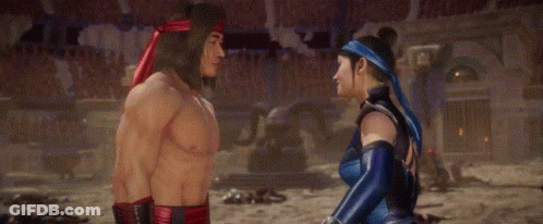 A Man And A Woman Hugging Each Other In A Video Game . GIF